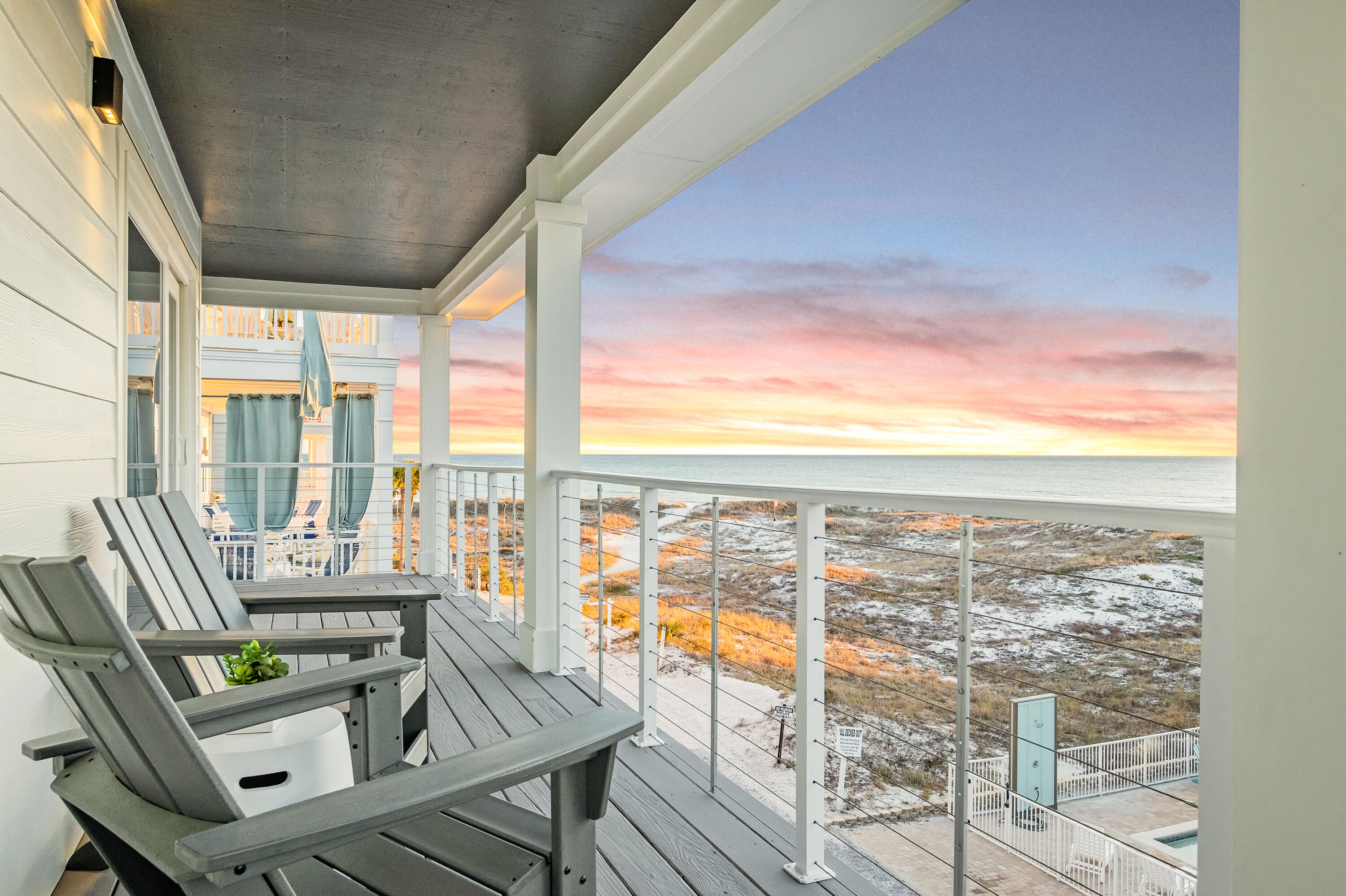 76 Hotz Avenue Santa Rosa Beach, FL 32459 - Photo 35 of 71 a view of a balcony with chairs