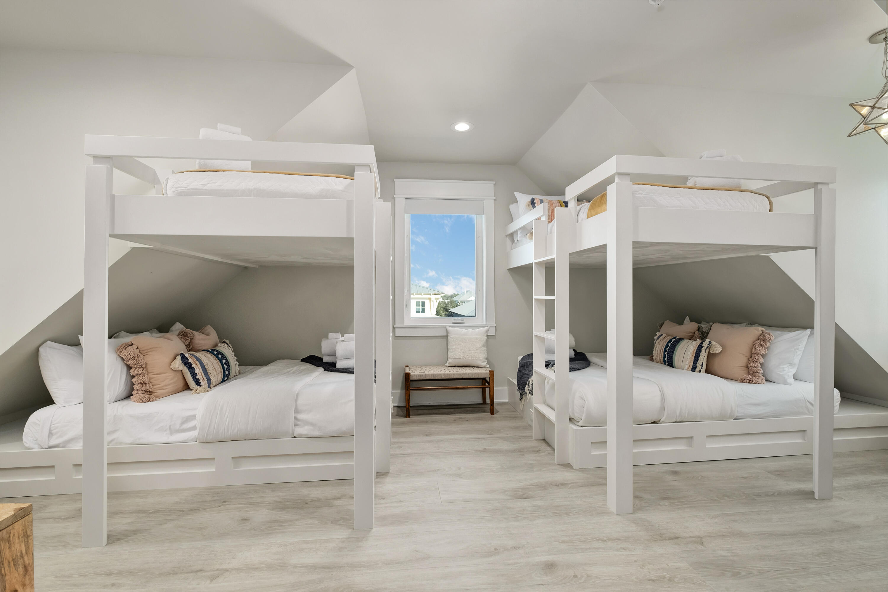 76 Hotz Avenue Santa Rosa Beach, FL 32459 - Photo 37 of 71 a bedroom with a bed and a mirror