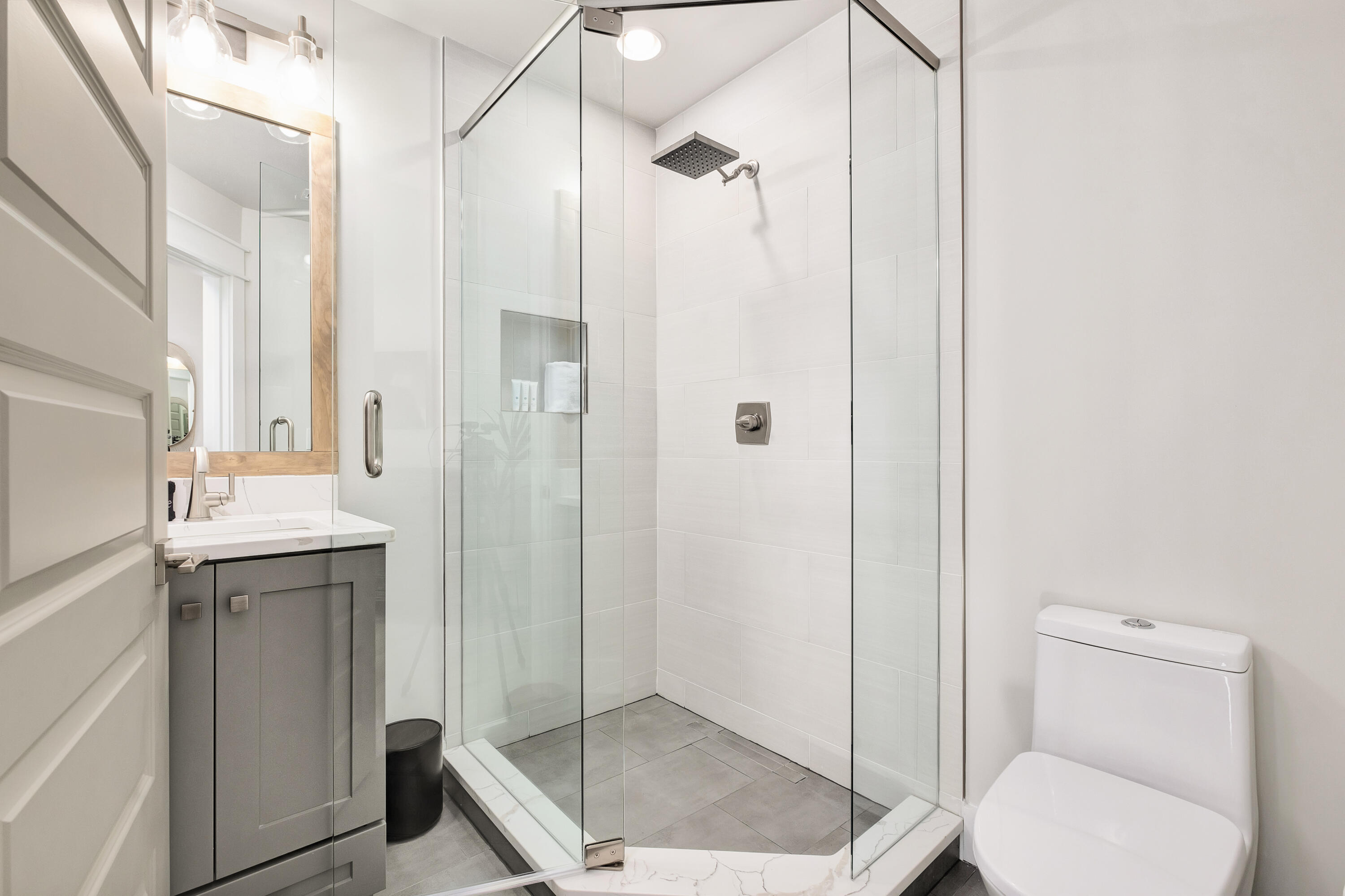 76 Hotz Avenue Santa Rosa Beach, FL 32459 - Photo 42 of 71 a bathroom with a granite countertop sink toilet and shower