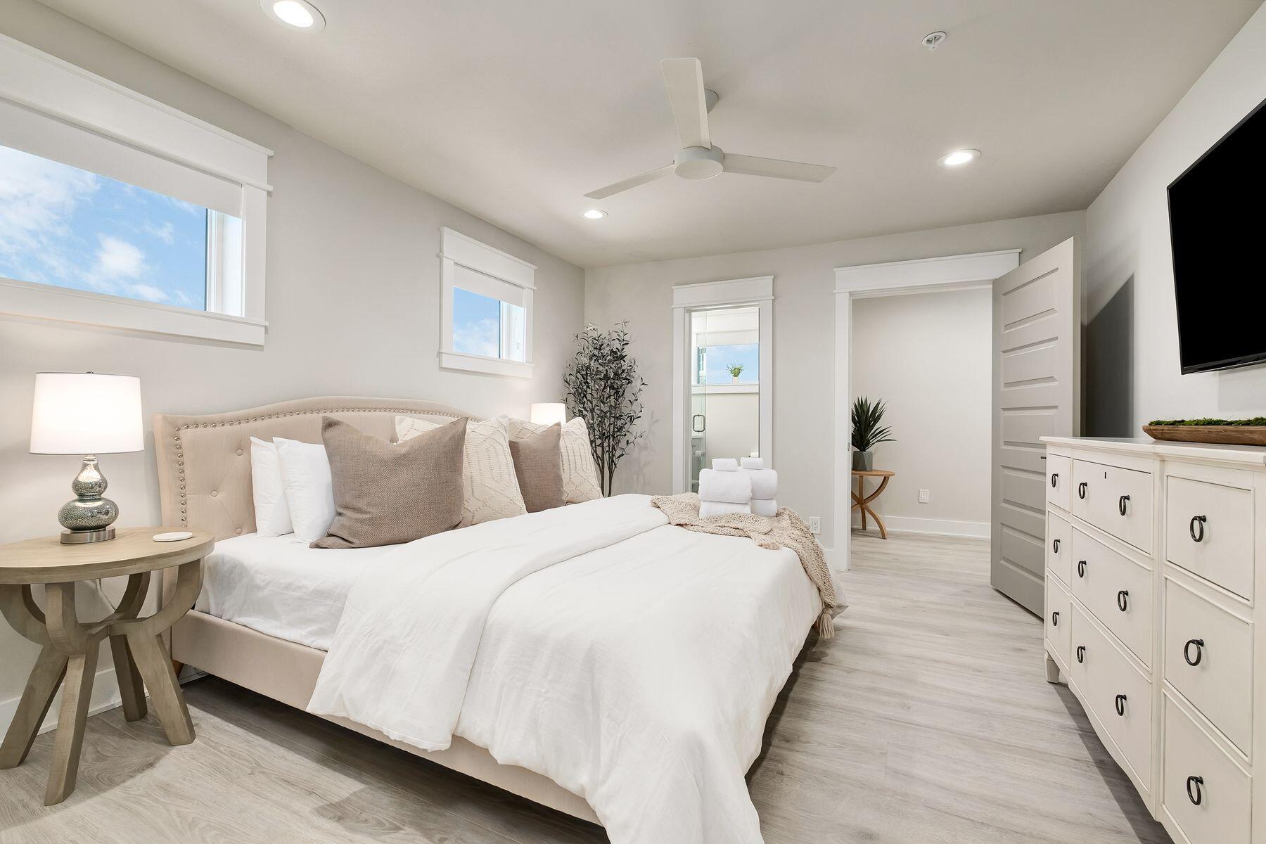 76 Hotz Avenue Santa Rosa Beach, FL 32459 - Photo 49 of 70 a bedroom with a bed and a flat screen tv