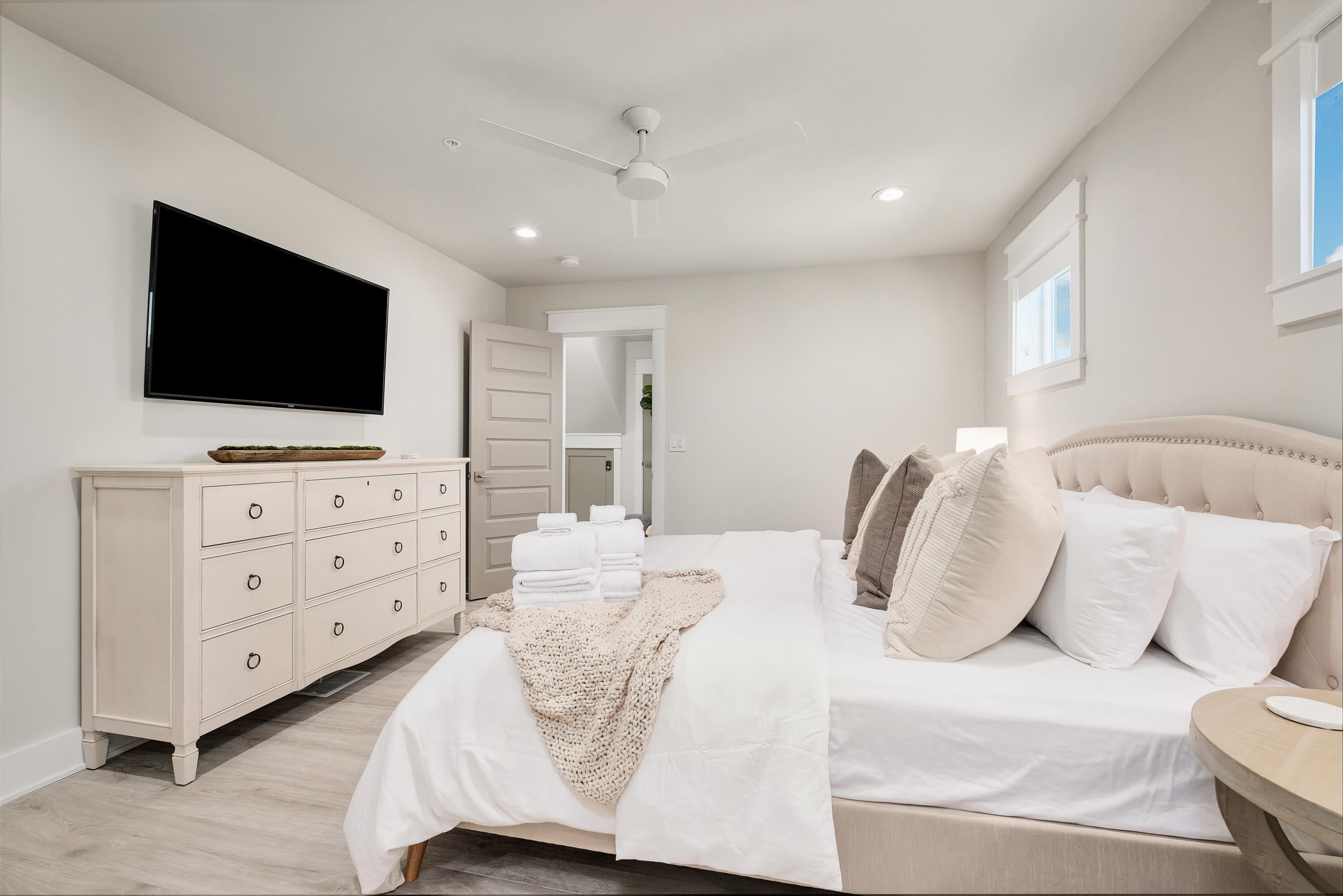 76 Hotz Avenue Santa Rosa Beach, FL 32459 - Photo 49 of 71 a bedroom with a bed and flat screen tv