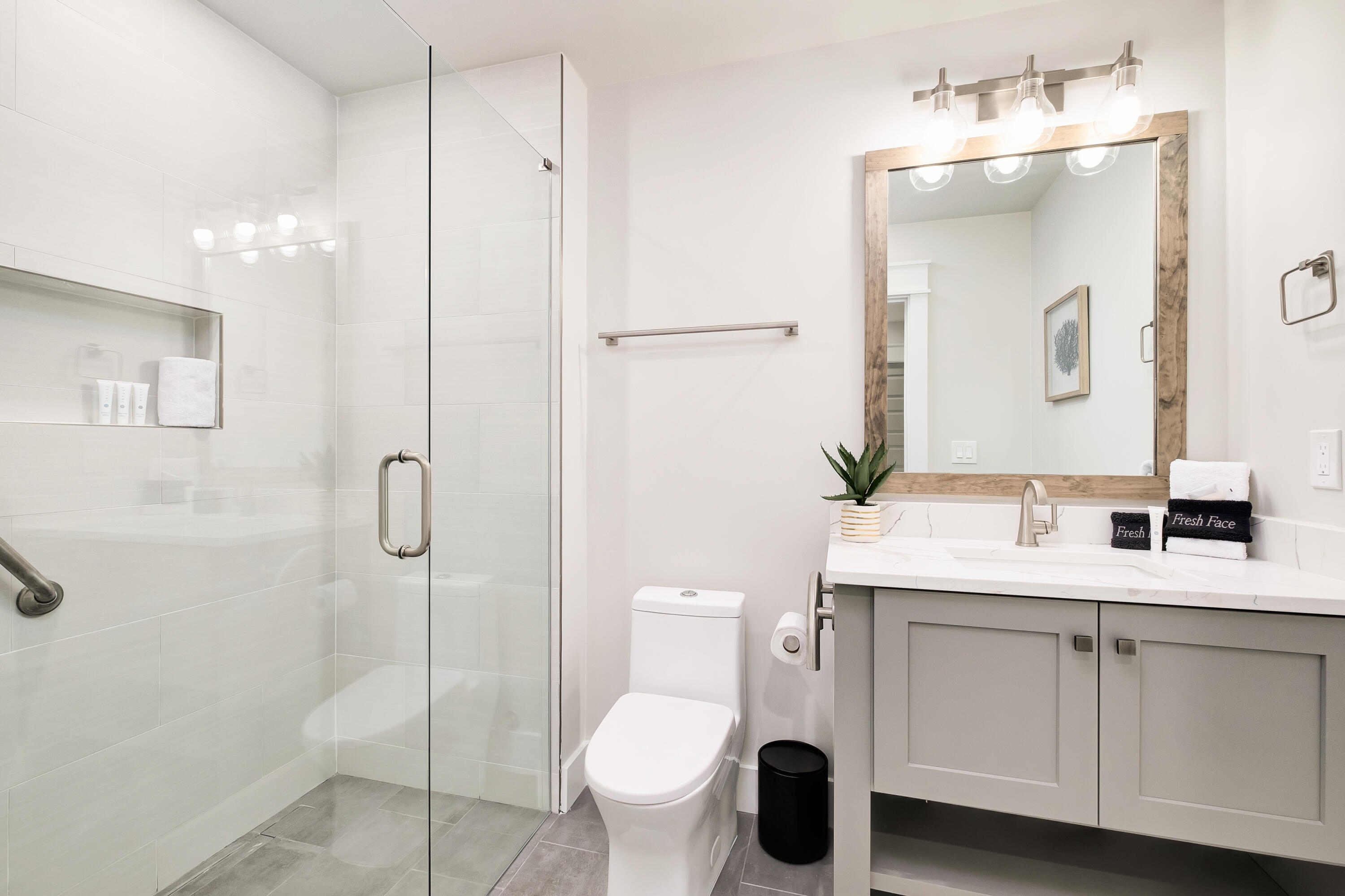 76 Hotz Avenue Santa Rosa Beach, FL 32459 - Photo 52 of 71 a bathroom with a double vanity sink mirror and toilet