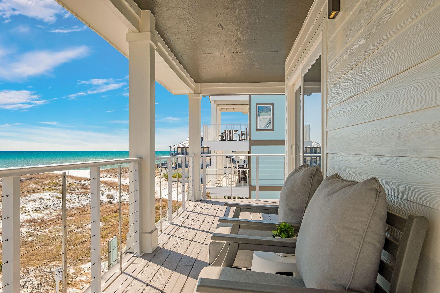 76 Hotz Avenue Santa Rosa Beach, FL 32459 - Photo 54 of 70 a living room with furniture and a floor to ceiling window