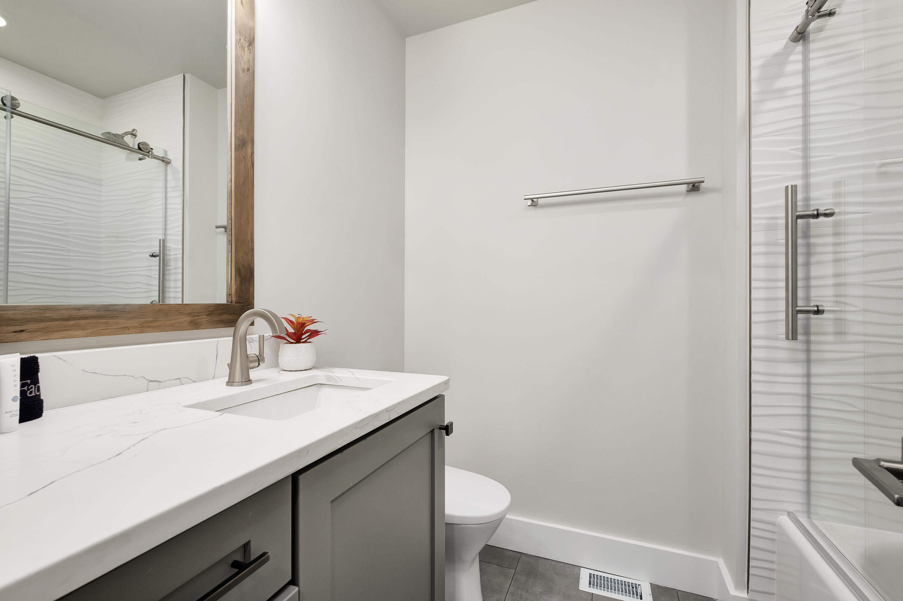 76 Hotz Avenue Santa Rosa Beach, FL 32459 - Photo 56 of 71 a bathroom with a sink toilet and vanity