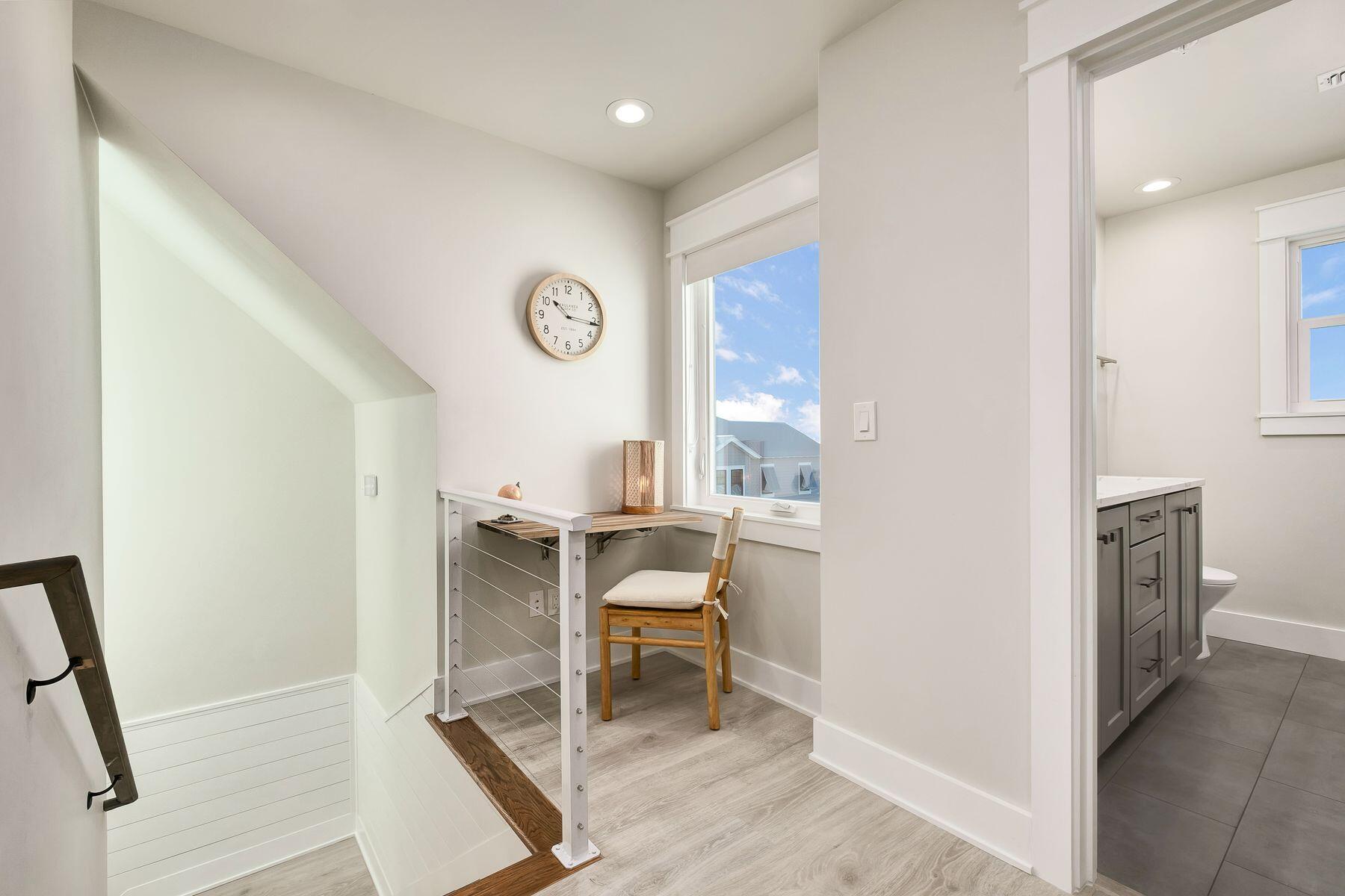 76 Hotz Avenue Santa Rosa Beach, FL 32459 - Photo 56 of 70 a view of a hallway with a window and dining room