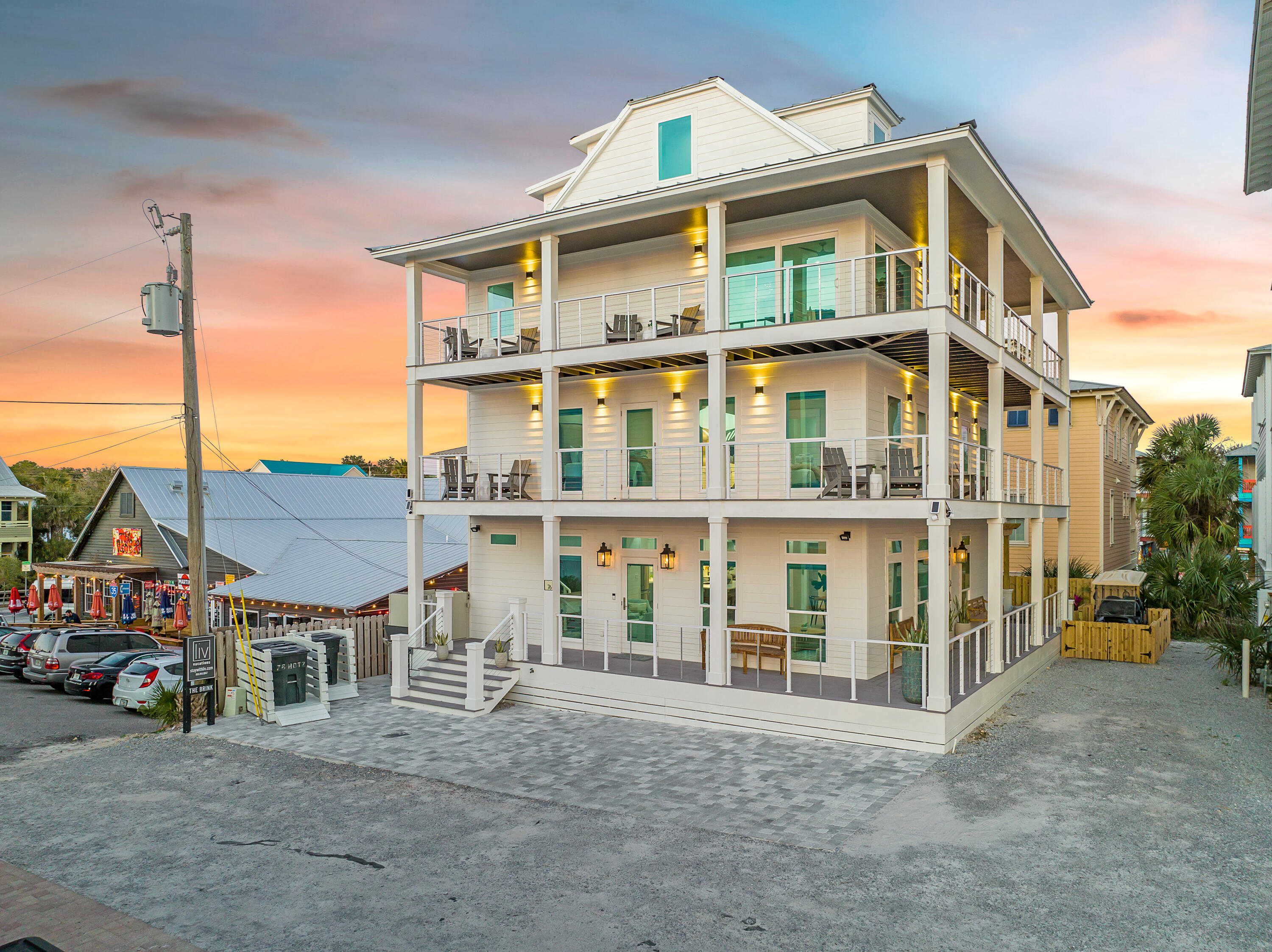 76 Hotz Avenue Santa Rosa Beach, FL 32459 - Photo 61 of 71 a front view of a residential apartment building with a yard