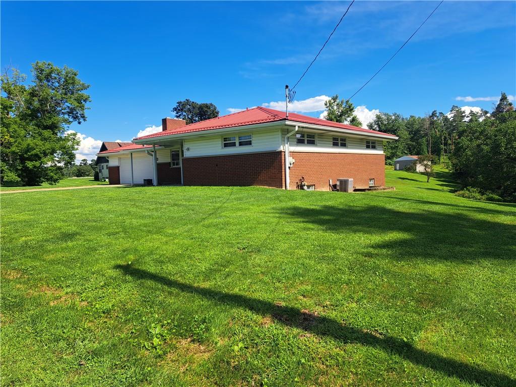530 Scott Hollow Road Burgettstown, PA 15021 - Photo 3 of 21 a front view of a house with a yard