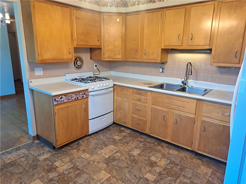 530 Scott Hollow Road Burgettstown, PA 15021 - Photo 9 of 21 a kitchen with stainless steel appliances granite countertop a sink stove and cabinets