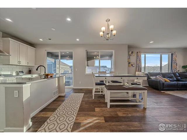 a bedroom with a bed and a tv