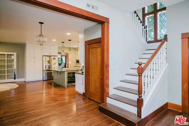 a view of a dining room with furniture and a fireplace