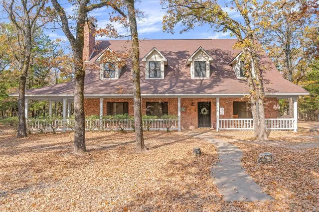 front view of a house with a garden