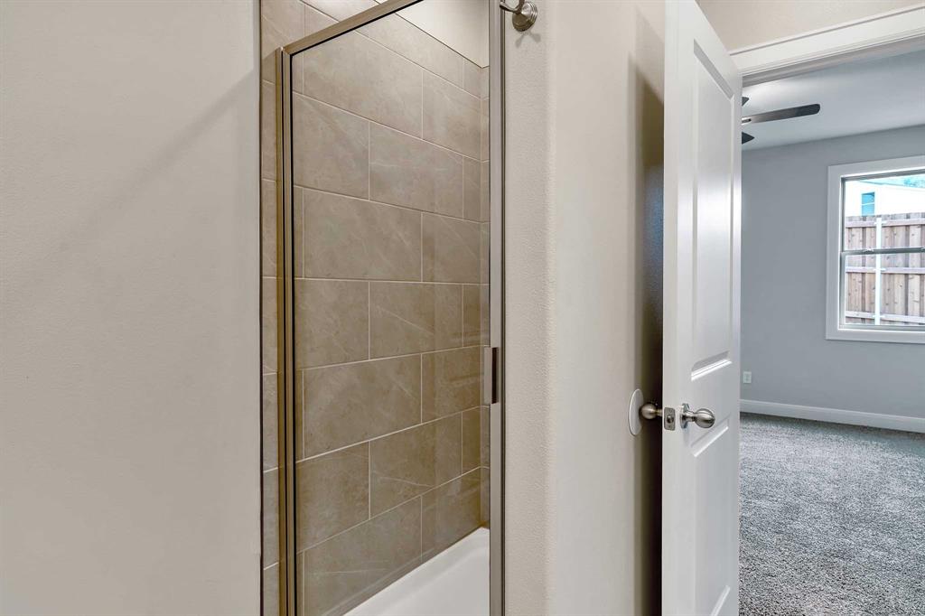 4344 Macnab Drive, Unit MULTI Tyler, TX 75707 - Photo 17 of 24 a bathroom with a shower