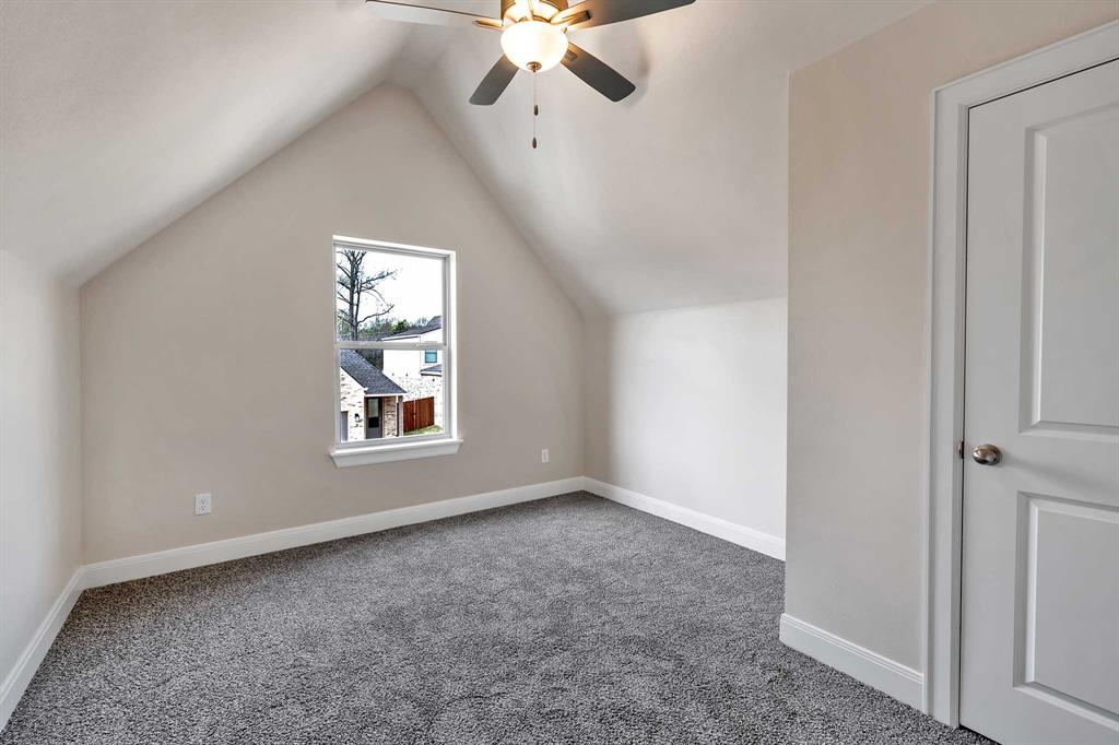 4344 Macnab Drive, Unit MULTI Tyler, TX 75707 - Photo 18 of 24 an empty room with a window and a fan