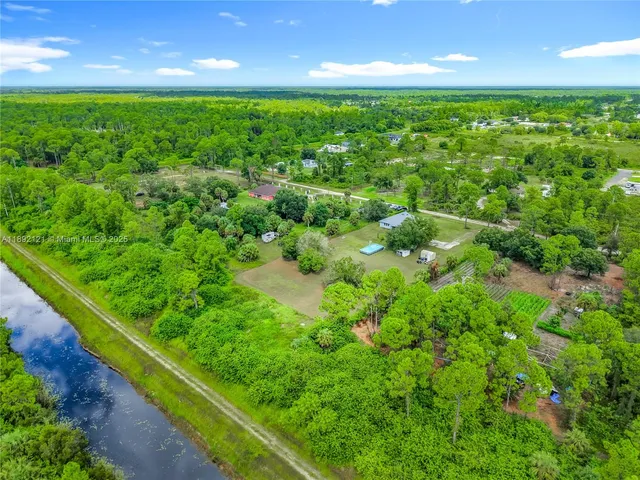 a view of a golf course with a lake