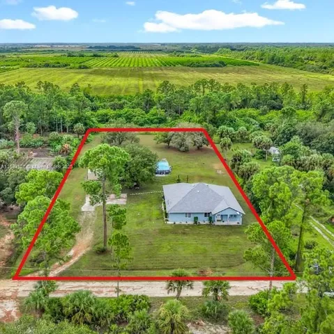 $459,900 | 7823 Canal Terrace, Lehigh Acres, FL 33936