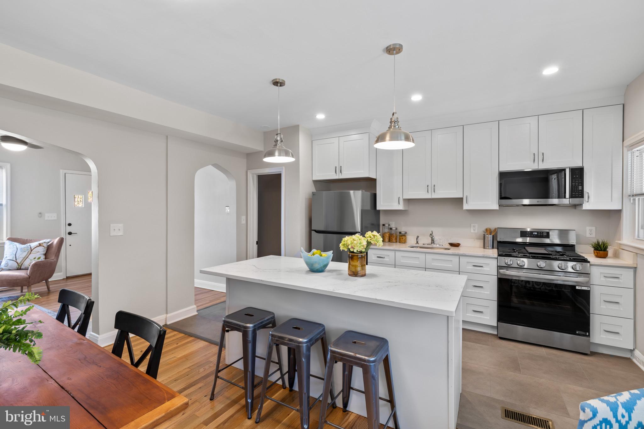 1115 Roland Heights Avenue Baltimore, MD 21211 - Photo 2 of 32 Dining Room and Kitchen