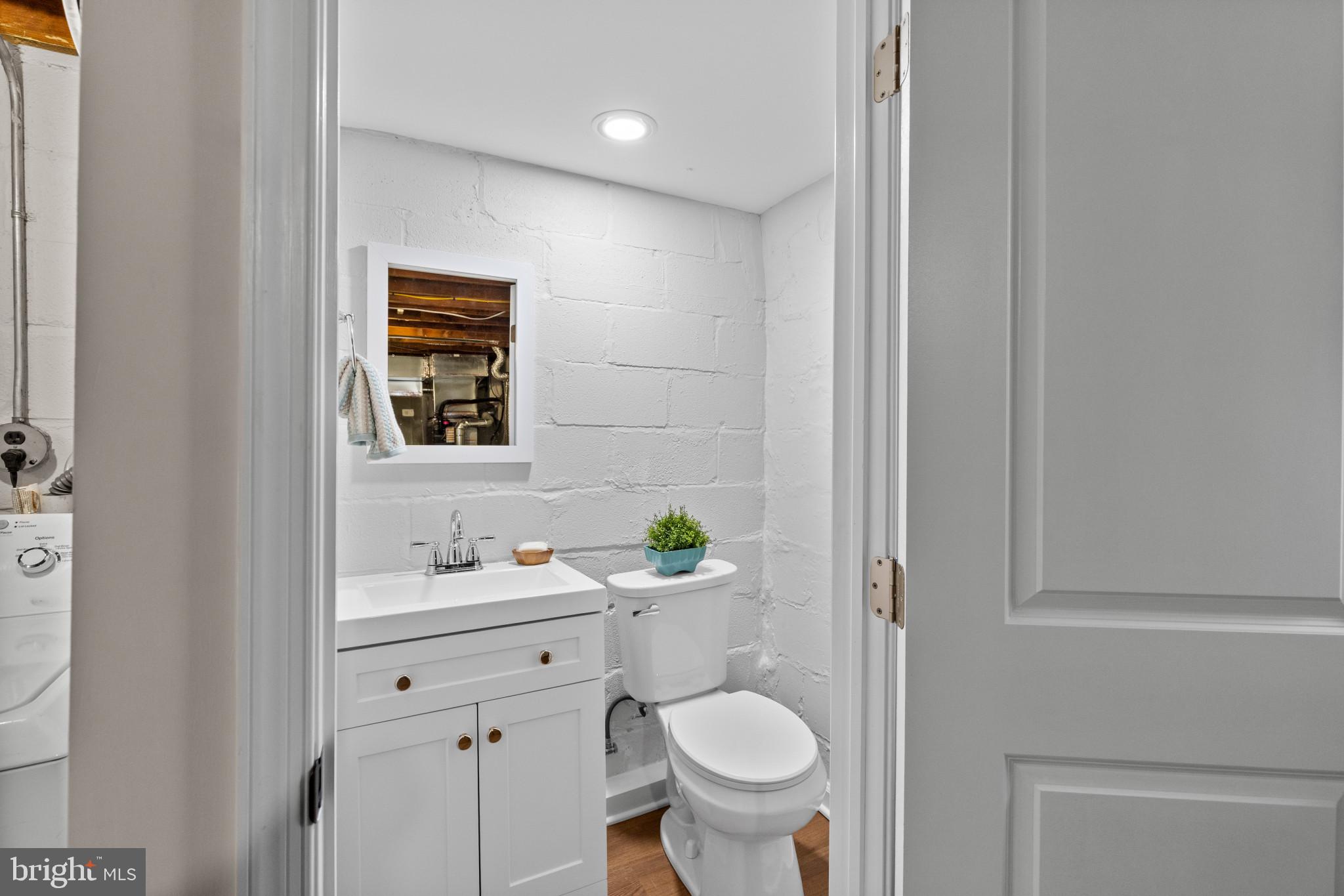 1115 Roland Heights Avenue Baltimore, MD 21211 - Photo 23 of 32 Half Bath