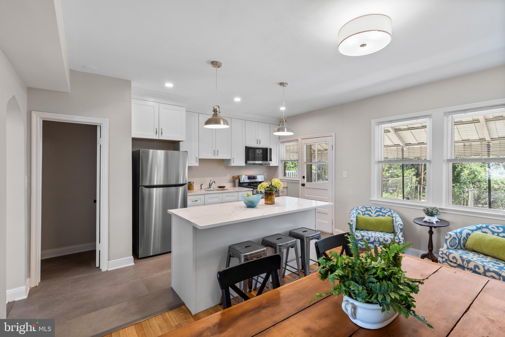 1115 Roland Heights Avenue Baltimore, MD 21211 - Photo 3 of 32 Dining Room and Kitchen