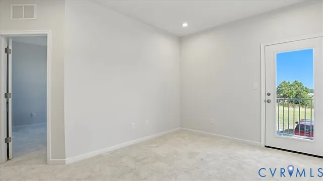 a view of a balcony with wooden floor