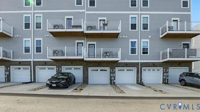 an aerial view of a house with a yard table and chairs