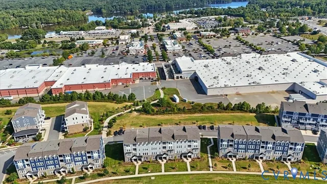 an aerial view of a house with a garden