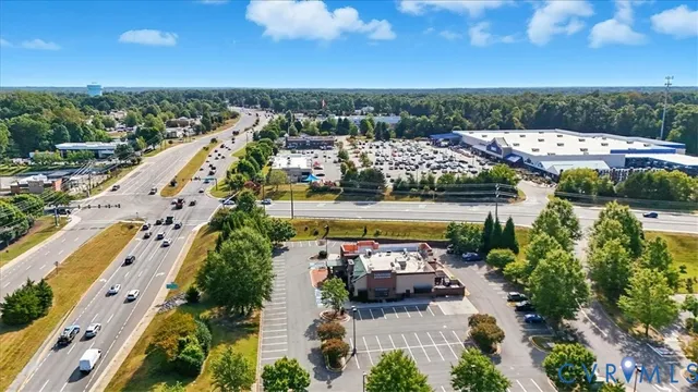 a view of a shop on the street