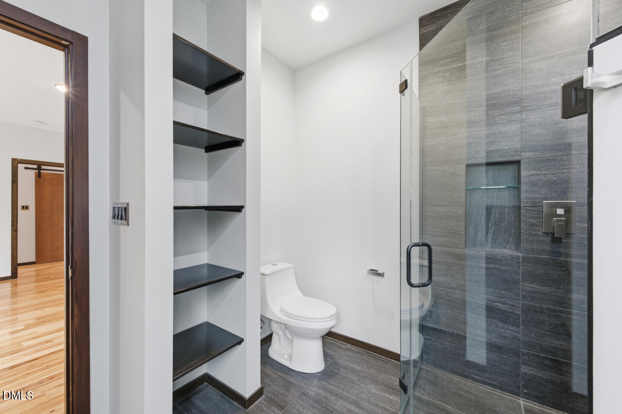 3315 Denada Path Durham, NC 27707 - Photo 33 of 74 a bathroom with a toilet and a shower