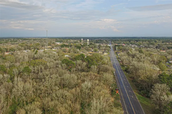 a view of balcony and yard