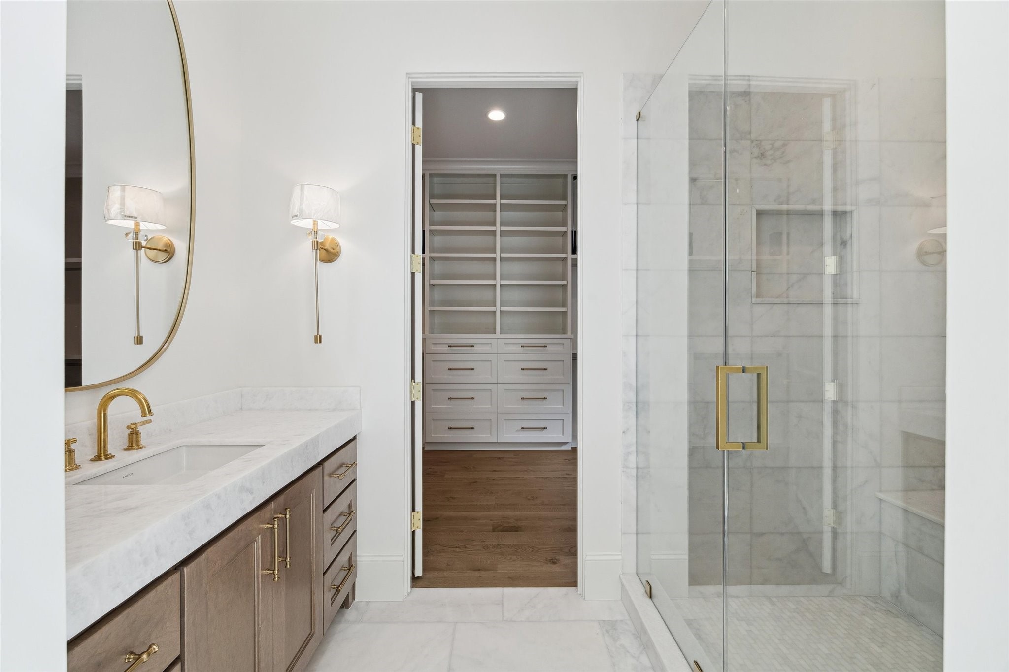 25 Wentworth Gate Path Houston, TX 77027 - Photo 2 of 32 This home is curated to exude timelessness through the meticulously selected materials and finishes.
