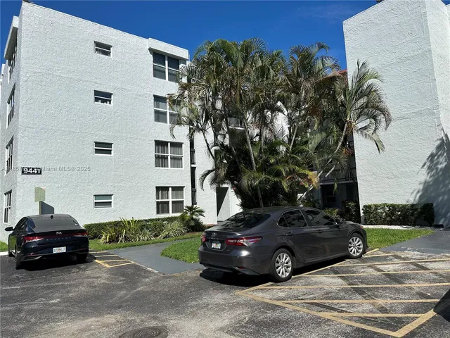 a car parked in front of a building
