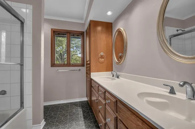 a view of a livingroom with a ceiling fan and window
