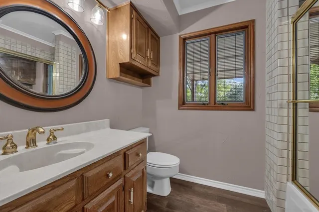 a bathroom with a sink and a toilet
