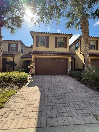 a front view of a house with yard