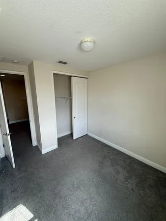 an empty room with closet