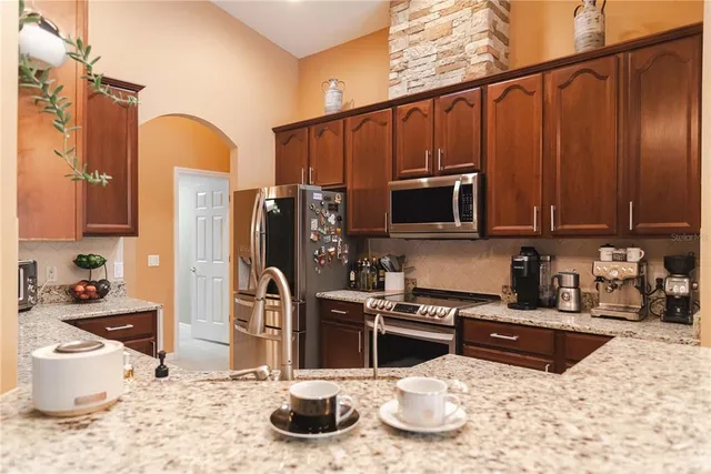 a bathroom with a tub and a window
