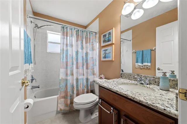 a view of a backyard with sitting area