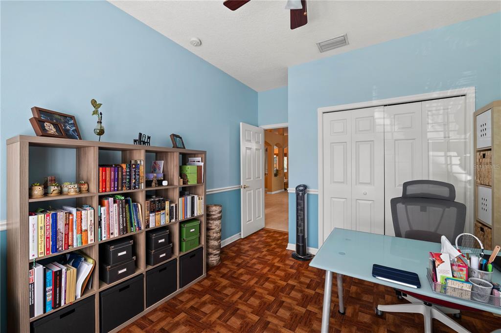 9020 North River Road Tampa, FL 33635 - Photo 35 of 86 a view of a workspace with furniture and toys