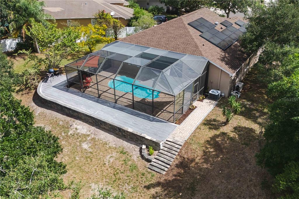 9020 North River Road Tampa, FL 33635 - Photo 69 of 86 an aerial view of a house with a yard