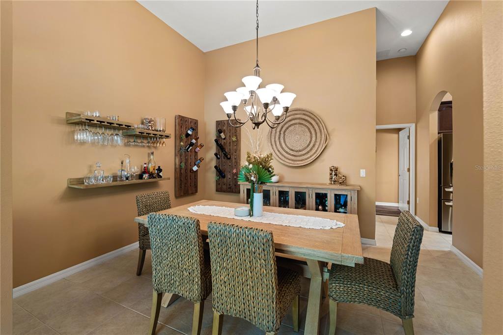 9020 North River Road Tampa, FL 33635 - Photo 9 of 86 a dining room with furniture and window