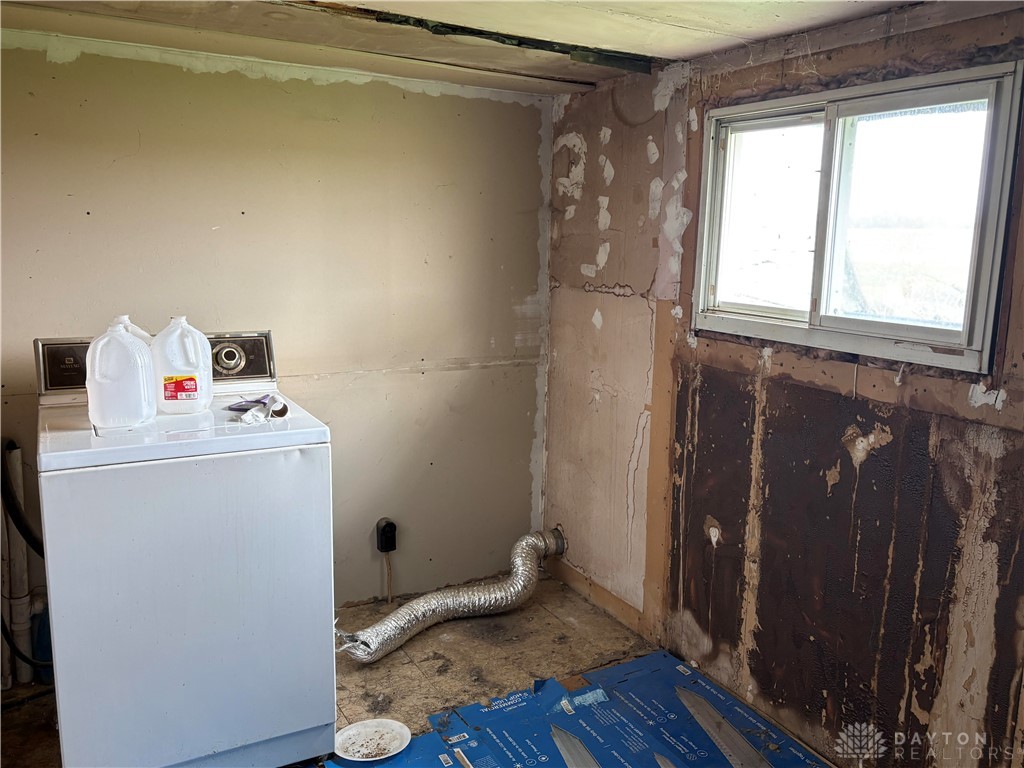 9006 Oakes Road Arcanum, OH 45304 - Photo 20 of 29 This functional utility space offers a dedicated area for laundry needs.