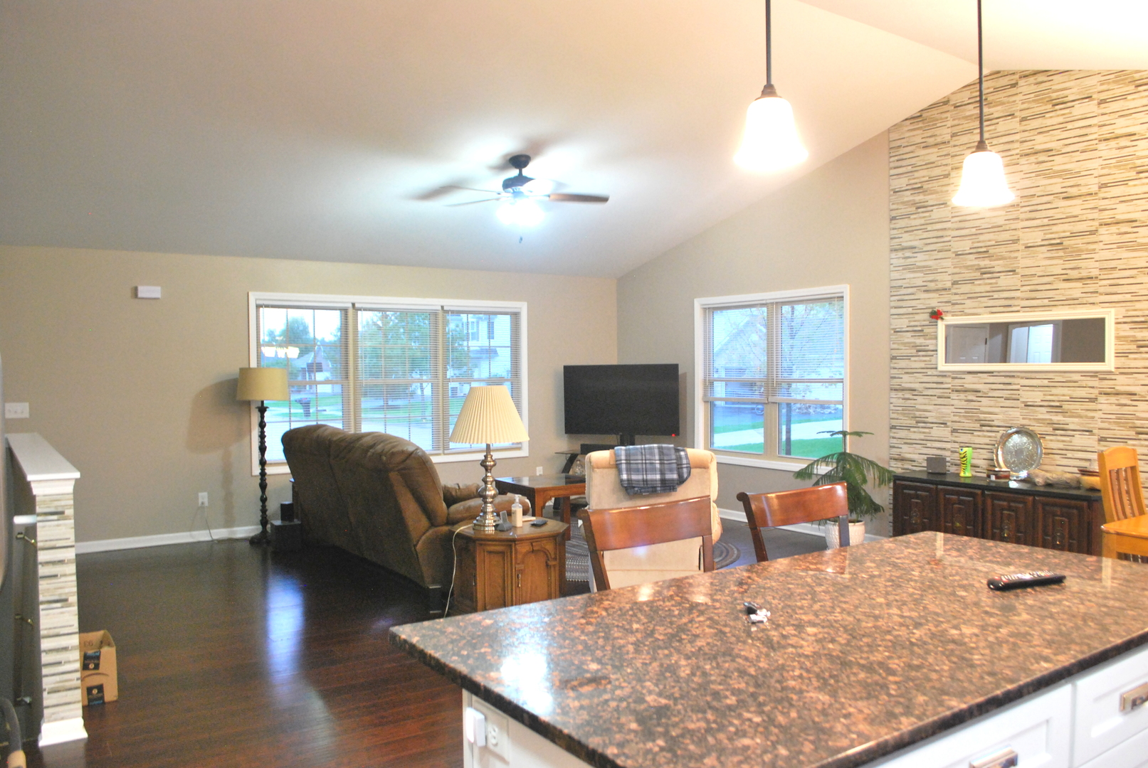 1091 Page Way Rochelle, IL 61068 - Photo 9 of 25 a living room with fireplace furniture and a wooden floor
