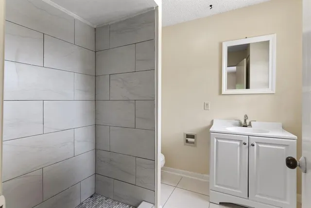 a bathroom with a sink toilet and