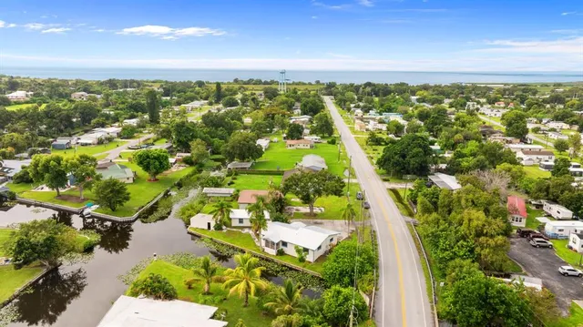 a view of city and green space