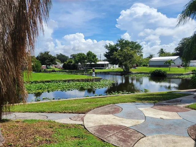 a view of a lake with a garden