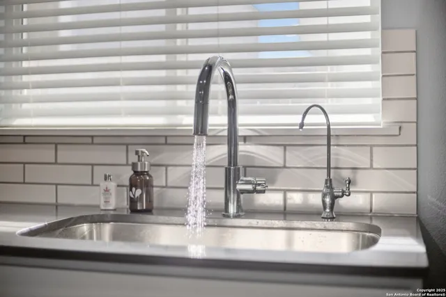 a kitchen counter top with a sink