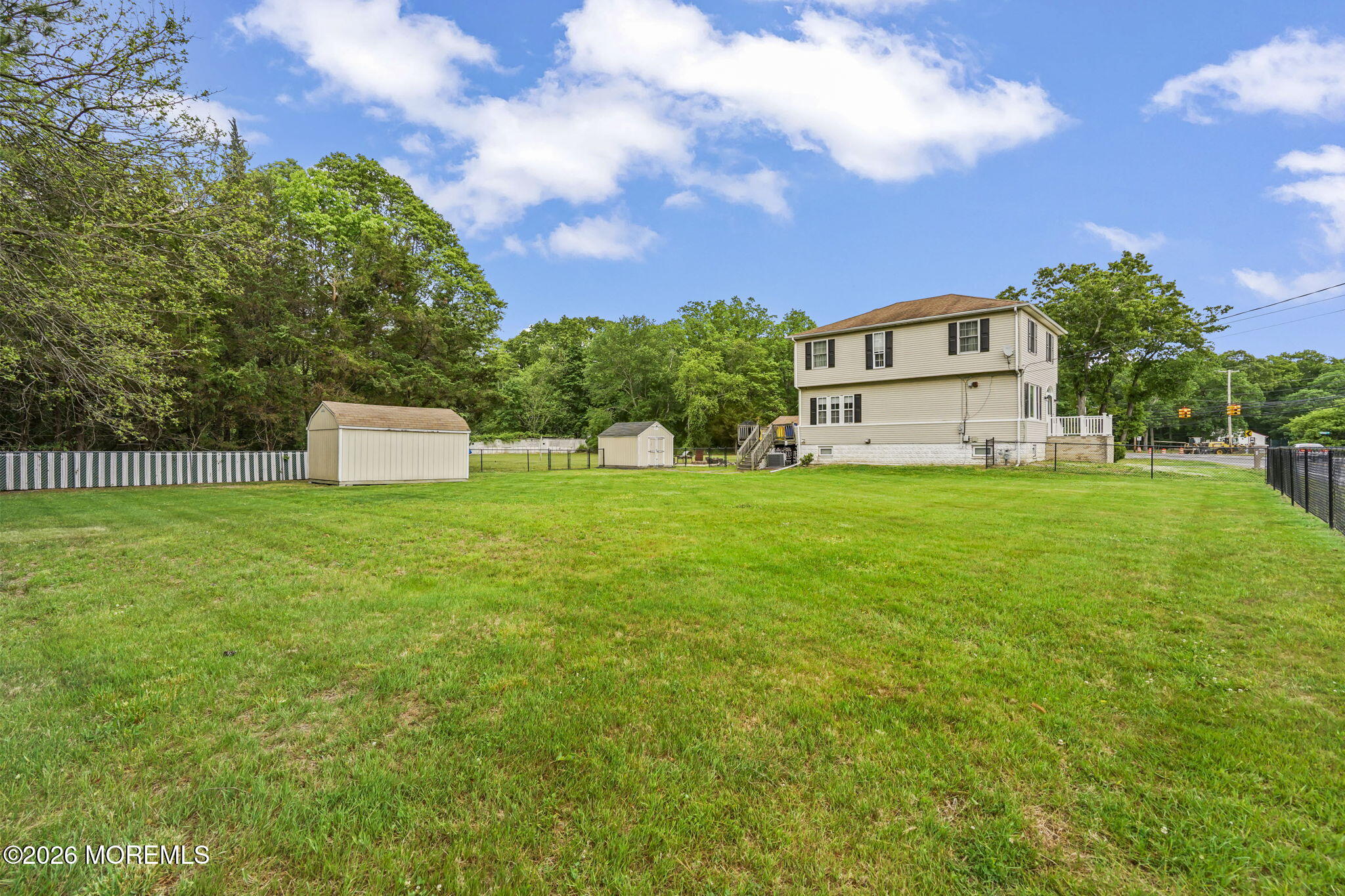 438 Bennetts Mills Road Jackson, NJ 08527 - Photo 28 of 42 a view of a house with a big yard and large trees