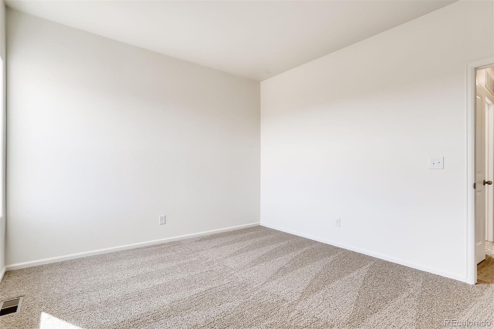 47517 Clover Avenue Bennett, CO 80102 - Photo 13 of 22 a view of an empty room