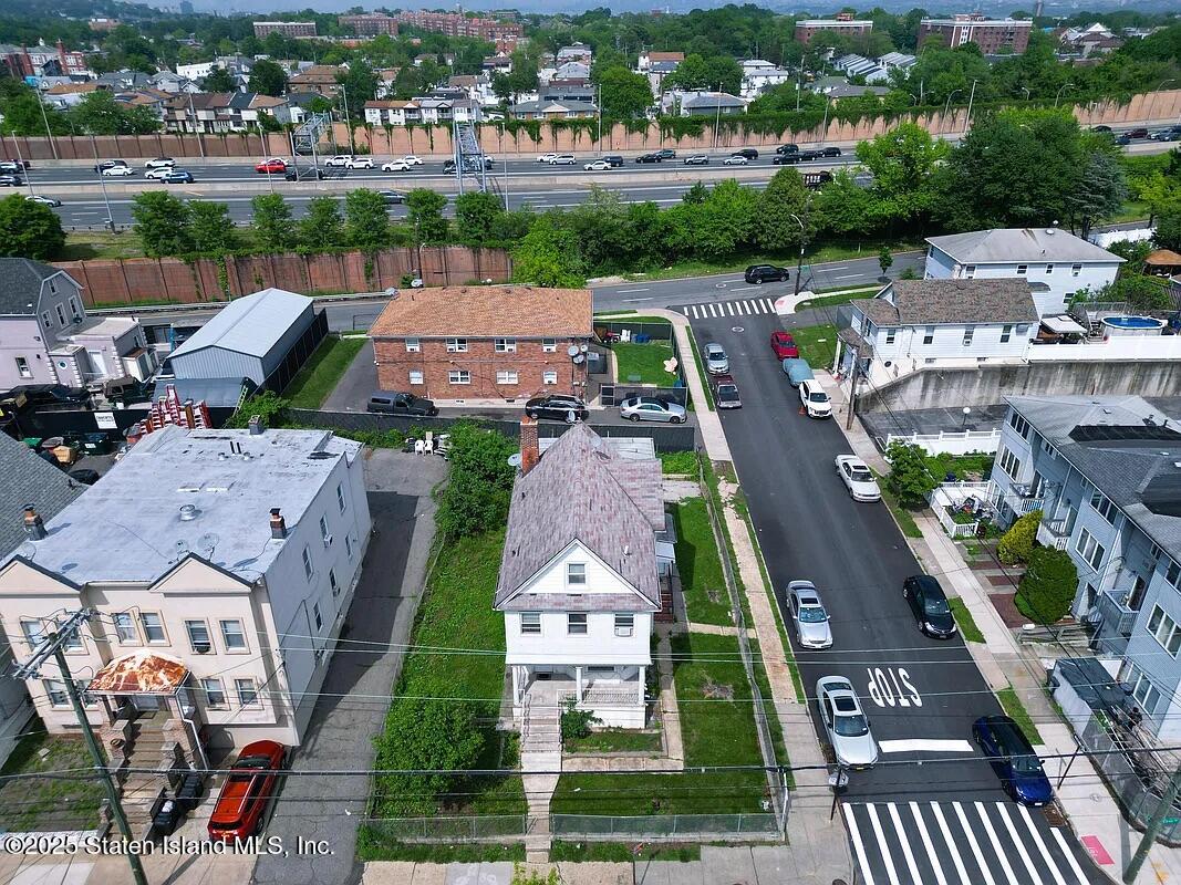 1905 Clove Road Staten Island, NY 10304 - Photo 23 of 29 an aerial view of multiple houses with yard