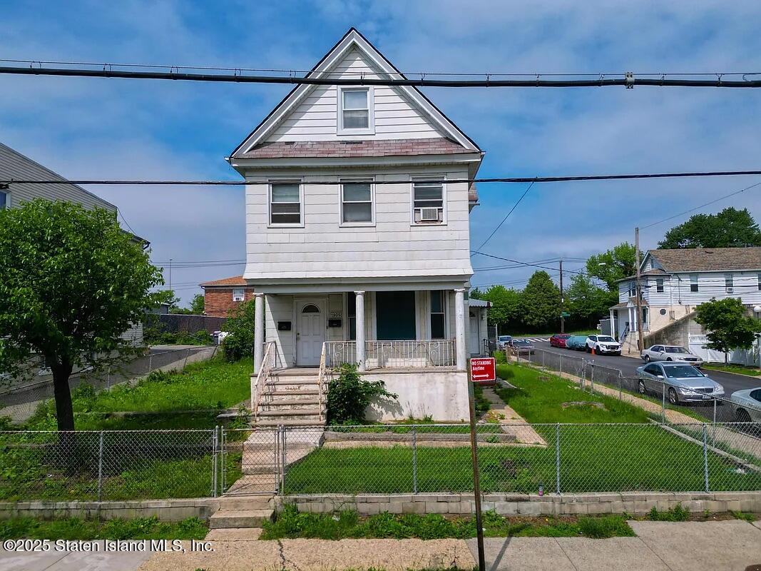 1905 Clove Road Staten Island, NY 10304 - Photo 4 of 29 a front view of a house with garden