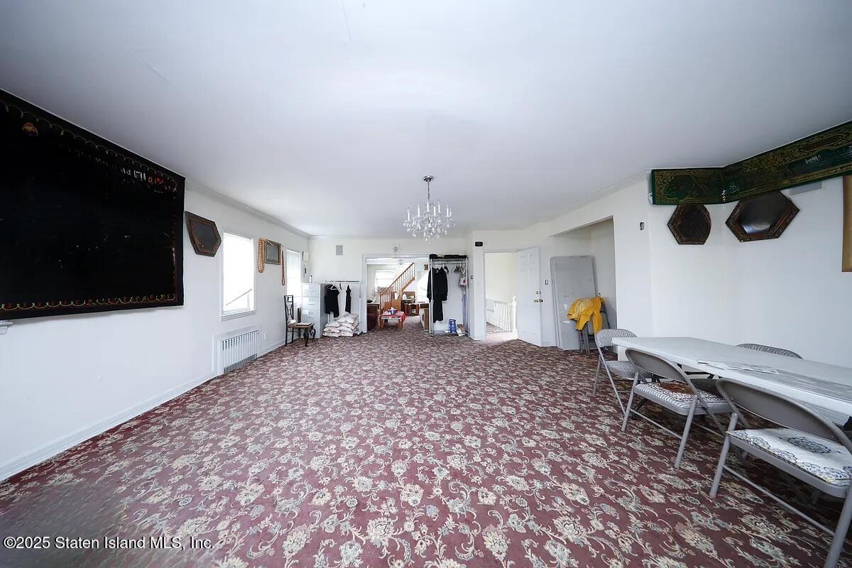 1905 Clove Road Staten Island, NY 10304 - Photo 8 of 29 a very nice looking room with a flat screen tv